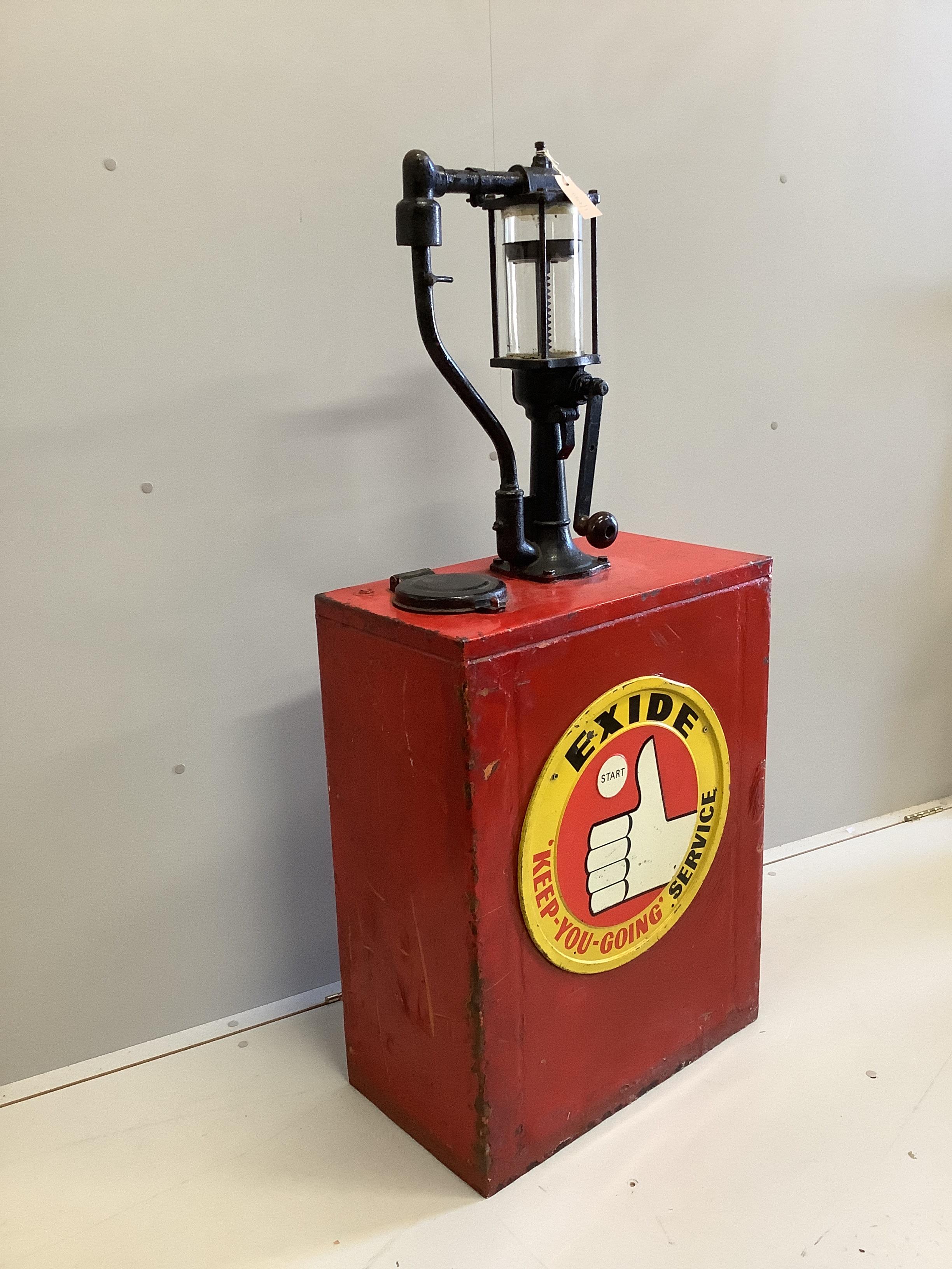 A vintage American Exide engine oil pump, width 58cm, depth 32cm, height 130cm